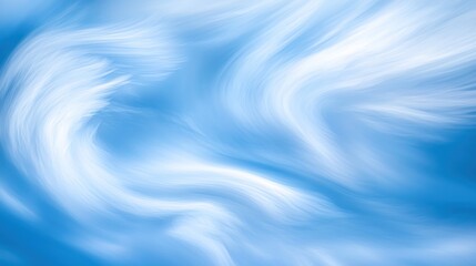 Abstract swirling blue and white cloudscape.