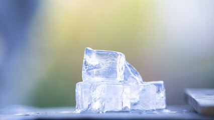 Ice cubes on wooden table