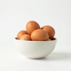 Brown eggs in a bowl isolated on white background