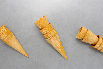 Waffle cones on grey background