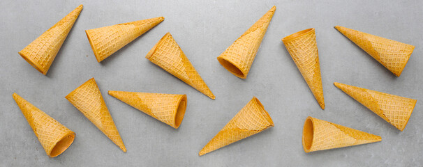 Waffle cones on grey background