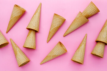 Waffle cones on pink background