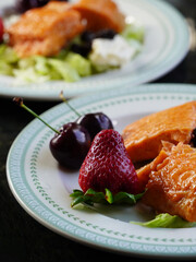 Delicious Christmas brunch with salmon, berries and caviar