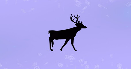 Black silhouette of reindeer walking over snowflakes floating against purple background