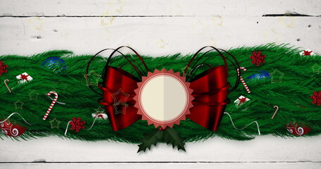 Fototapeta premium Image of stars falling over christmas decorations