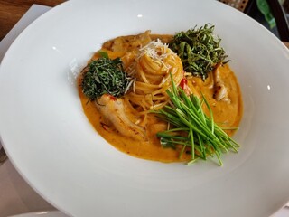 Tomato sauce and whipped cream. rose pasta