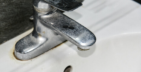 contaminated limestone water in the tap dirty water in bathroom