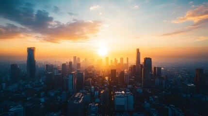 Fototapeta premium Golden Sunset Over City Skyline Illuminates Buildings