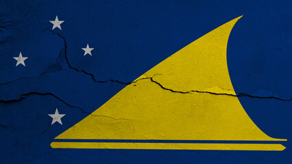 Tokelau flag on cracked wall background, flag with crack line