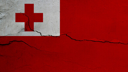 Tonga flag on cracked wall background, flag with crack line