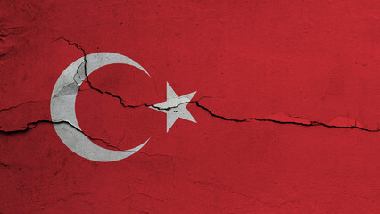 Turkey flag on cracked wall background, flag with crack line