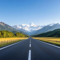 Naklejka premium Serene Open Road Surrounded by Majestic Snow-Capped Mountains and Lush Green Forest under Clear Blue Sky in a Picturesque Landscape Setting