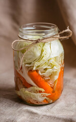 glass jar with pickled vegetables