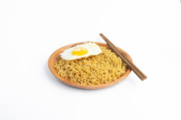 Instant Noodles with Fried Egg and Chopsticks