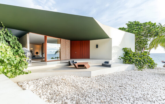 Modern beachfront house with a tropical setting and minimalist design near the ocean