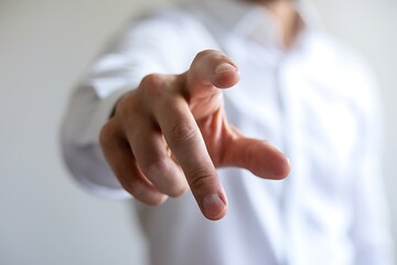 Naklejka premium Close-up of Hand with Extended Index Finger Pointing
