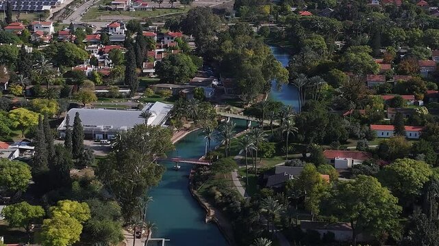 Aerial view over Kibbutz Nir David with Asi river
Drone view from Israel, 2024
