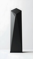 A matte black podium with an angular, geometric design, standing on a plain white background for high-tech product presentation