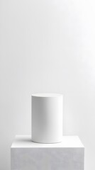 A minimalist white podium with a smooth finish, standing against a clean white background for product display