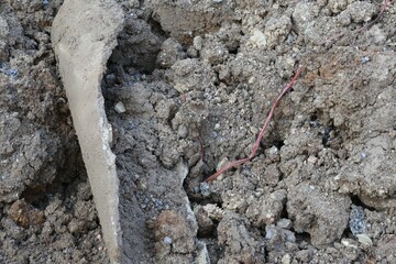 Excavation, construction of drainage pipes under buildings