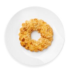 Dessert, shortcrust pastry ring with nuts, on white background, isolated. Top view.