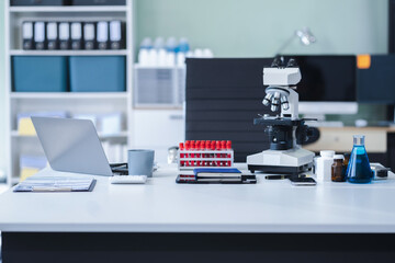 workspace area science lab test tubes, lab equipment.