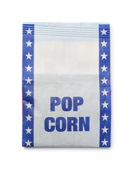 Unpopped microwave popcorn in paper bag