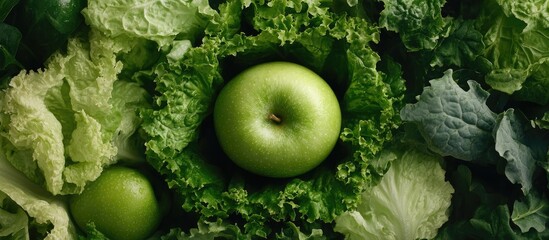 Green apple surrounded by fresh greens symbolizing vitality and health with ample space for text or branding purposes