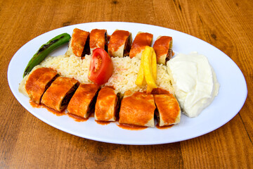 Famous Urfa meat liver, ciger wrapped by lavash with roasted chili pepper, onion and sauce in Sanliurfa, Turkey. Kuzu et ciger sis. Izgara dana bonfile, cop sis, kuzu pirzola. Karisik kebap, beyti keb