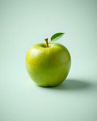 image d'une pomme verte avec des feuilles sur sa tige
