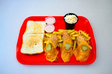 Homemade fried chicken nuggets isolated on white background. Chicken nugget. Citir tavuk. Citir, tavuk atistirma  tabagi.
