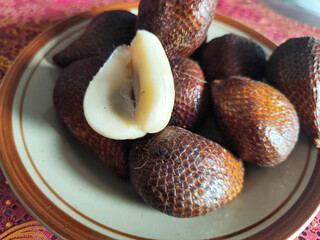 Salak fruit is a snake fruit. Salak is a fruit that tastes very good with a slightly rough skin texture.