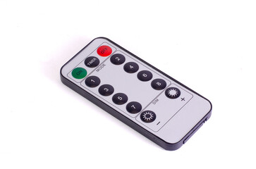 remote control for new year garland on white background