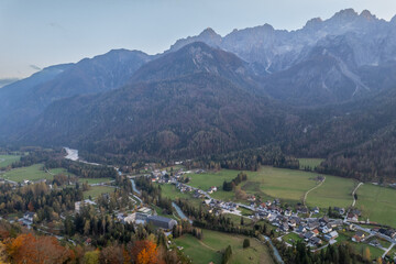 Drone Kranjska gora, slovenia, aerial view of the valley and the julian alps in autumn