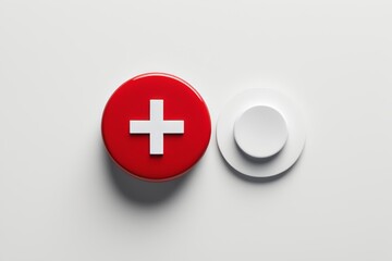 Obraz premium a close up of a red button with a white cross on it