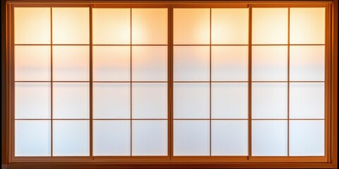 Illuminated Japanese Shoji screen sliding door with gridded frosted glass panels.