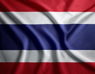 Fototapeta premium A flag of Thailand is flying in the sky. The flag is red, white, and blue