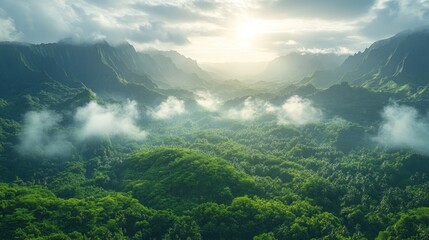 Obraz premium Lush green mountains under a cloudy sky with sunlight breaking through.