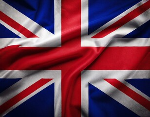 Fototapeta premium Close up full framed wave United Kingdom Union Jack fabric flag background.