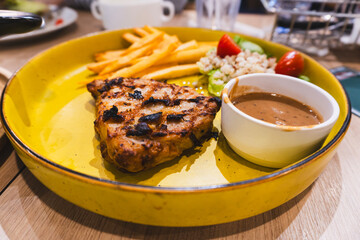 Grilled steak with fries