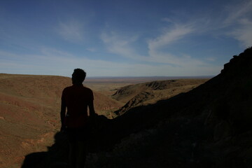 A man surveys the Namibian landscape