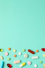 Various pills on a colored background