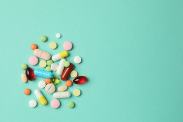 Various pills on a colored background