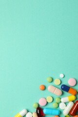 Various pills on a colored background