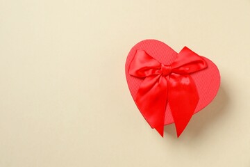 Beautiful gift box on color background