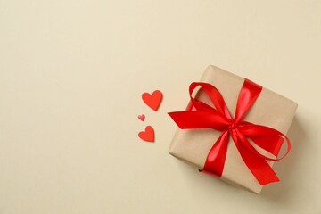 Beautiful gift box on color background