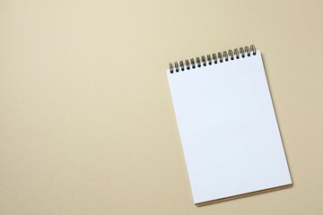 Top view photo of notebook on color background with blank space. Business concept