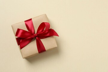Beautiful gift box on color background