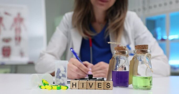 A dedicated scientist documents important findings and observations about hives while in a laboratory