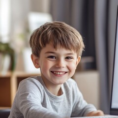 Boy learns with computer.